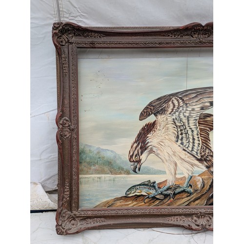 1048 - An oil on canvases painting of a hawk eating a fish by Winton, with a quality vintage wood carved fr... 