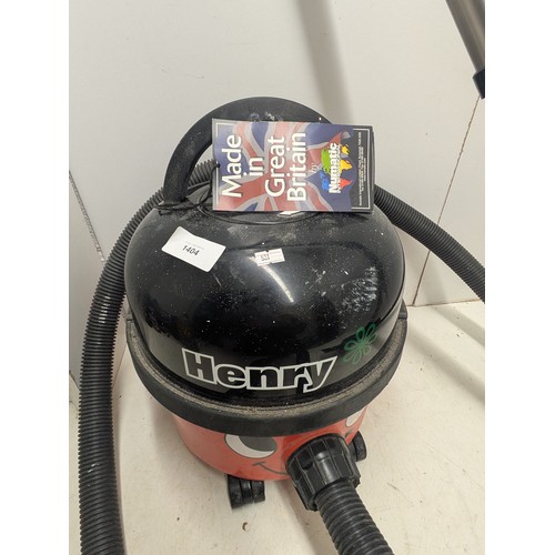 1404 - A Henry Pneumatic Vacuum Cleaner with hose and Attachment