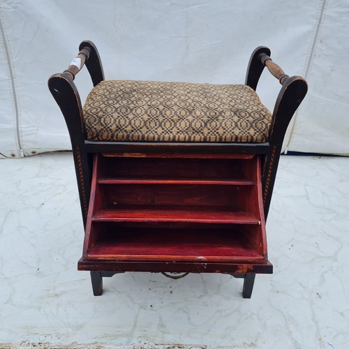 629 - An Antique Stained Oak Seat With Detailed Wooden Inlay and Brass Accents