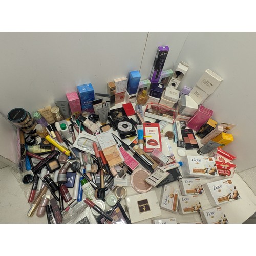 2056 - A large quantity of women's makeup including Avon, sleek, revolution pro, etc