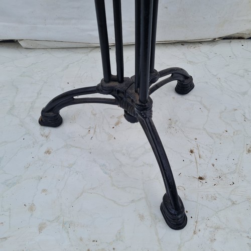 620 - A vintage circa 1930s occasional table with cast iron stylish base and oak, walnut chestnut top