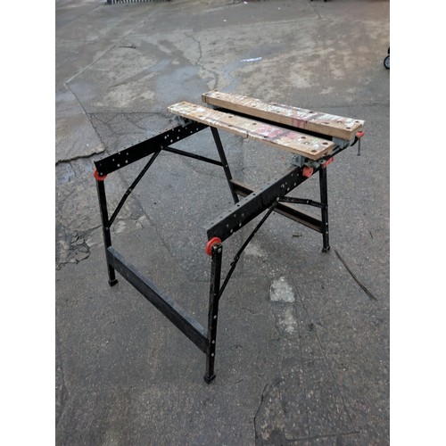 203 - A large folding Black and Decker work bench