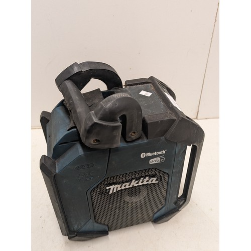 1720 - A Makita MR007G Bluetooth Radio - Fire Damaged