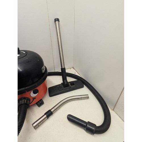 1486 - A Numatic Henry Hoover with accessories - Powers on