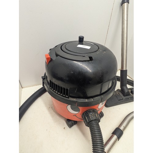 1486 - A Numatic Henry Hoover with accessories - Powers on