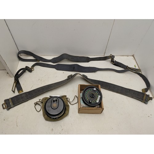 1072 - A Collection of vintage fishing gear including reels, pouches, belts, etc