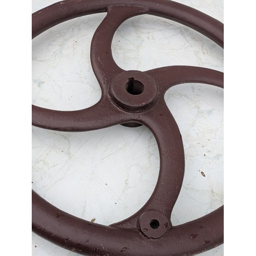 278 - A Cast Iron Agricultural Machinery Wheel