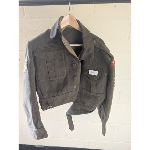 1069 - A Circa WW2 British Army Jacket with Patches From 'Grenadier Guards' and Officer Rank