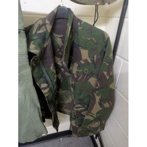 2044 - A Selection of Camouflaged British ERDL military clothing including jacket, hat and trousers