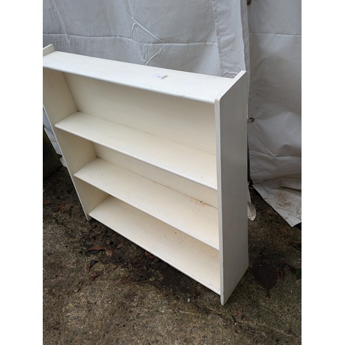 434 - A graduated Pine bookcase painted white