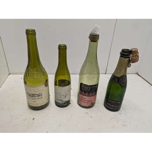 825 - A Selection of 4 Champagne Bottles Including Alfred Gratien, Gotes du Rhone