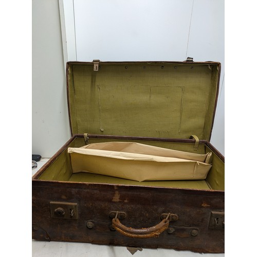 1879 - A Vintage Leather Suitcase