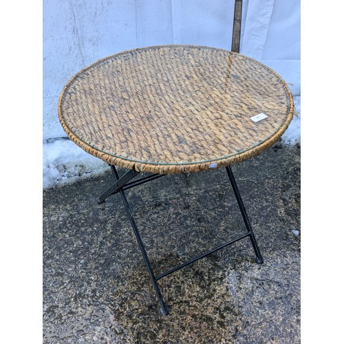 281 - A Metal Framed Wicker And Glass Topped Conservatory Table