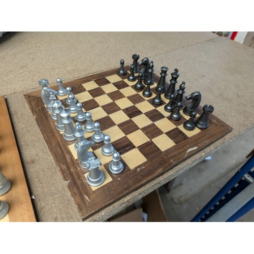 1525 - A Selection of 2 Travel Chess Sets