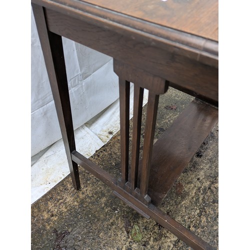 481 - An early 20th century oak art deco style table