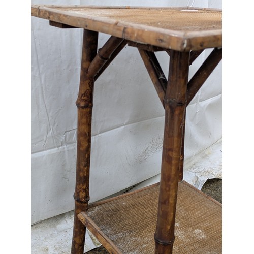 501 - A bamboo and wicker occasional table