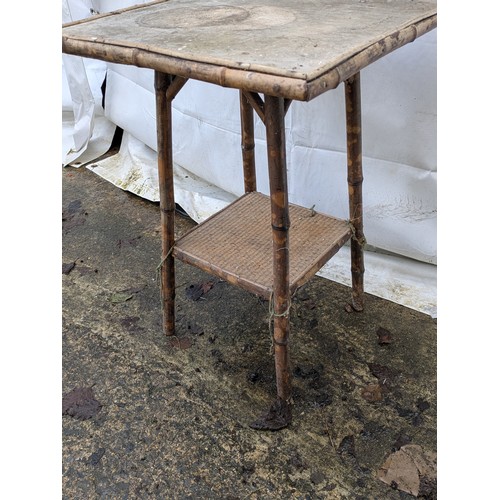 504 - An antique bamboo occasional table