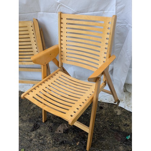 503 - A pair of finished plywood garden chairs