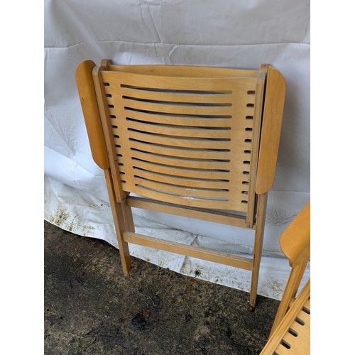 503 - A pair of finished plywood garden chairs