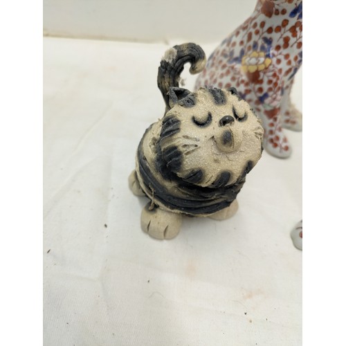 812 - A Selection of ceramic cat figures including a pair of oriental Florally patterned pieces