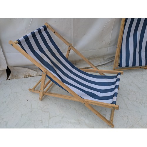 9 - A pair of pine sun loungers