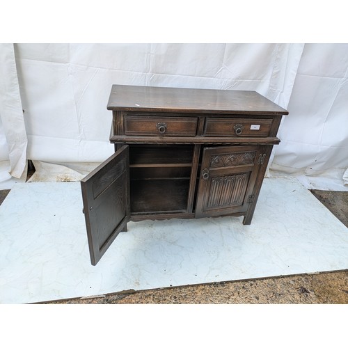 465 - An antique style oak storage cabinet by old charm furniture