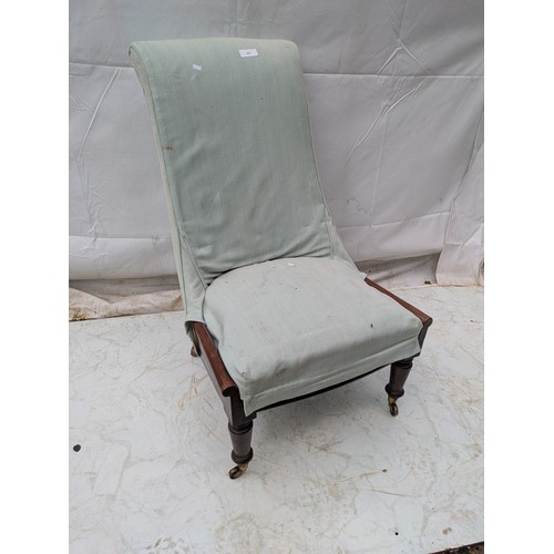 491 - A blue upholstered lounge chair