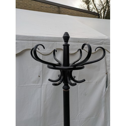 488 - A stylish pine coat and hat stand - painted black