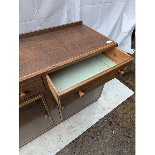 466 - An oak storage cabinet with 2 drawers and 2 cabinet spaces - mid century?