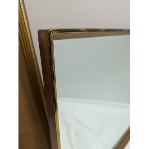 461 - A pair of wall mounted mirrors