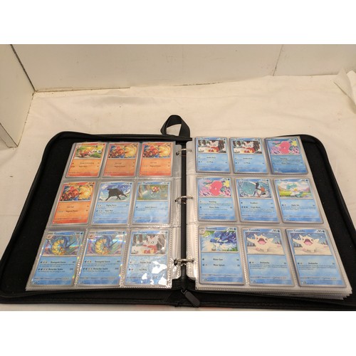 1882 - A Selection of various Pokémon cards in a binder