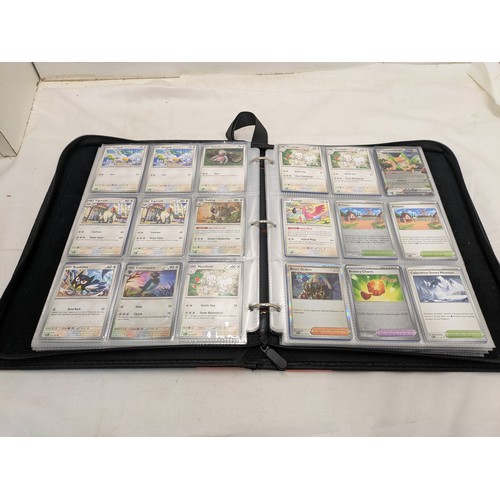 1882 - A Selection of various Pokémon cards in a binder