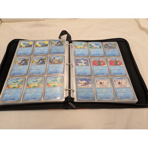 1882 - A Selection of various Pokémon cards in a binder