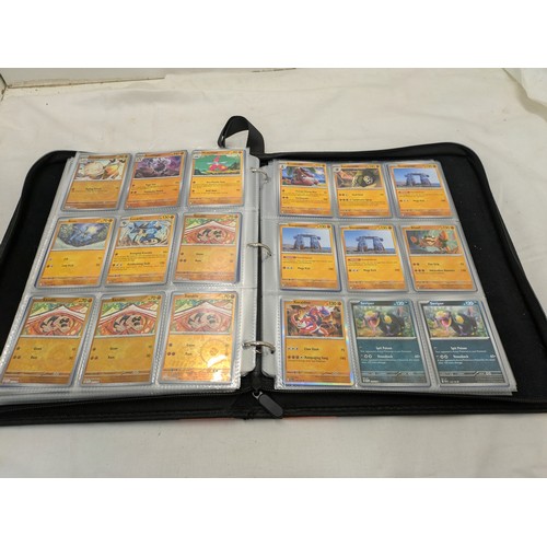 1882 - A Selection of various Pokémon cards in a binder