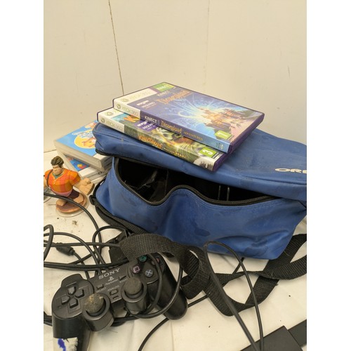 1240 - A Selection of gaming equipment including a cad eof Disney jnfity figures, ds games and a ps2 contro... 