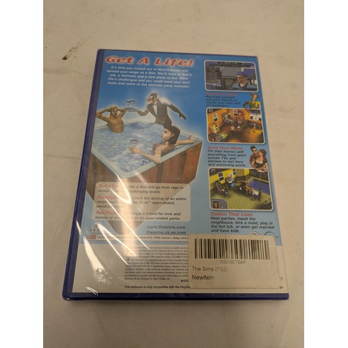 1236 - A copy of the Sims for playstation 2 - in factory cellphone