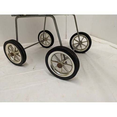 1866 - A vintage toy pushchair