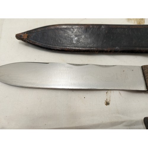 1853 - A Selection of 2 knives - on a USMC replica and the other being a miniature machete in sheath