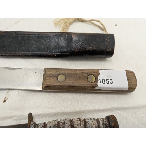 1853 - A Selection of 2 knives - on a USMC replica and the other being a miniature machete in sheath