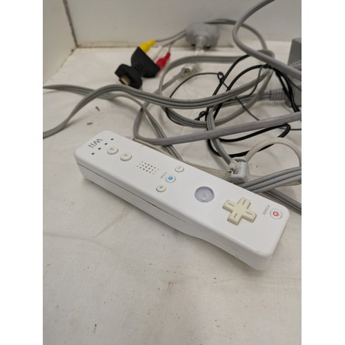 1220 - A Nintendo Wii console and accessories