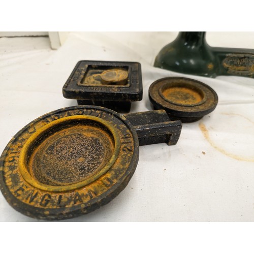 836 - A vintage 'the viking' weighing scales with a selection of brass and cast iron weights