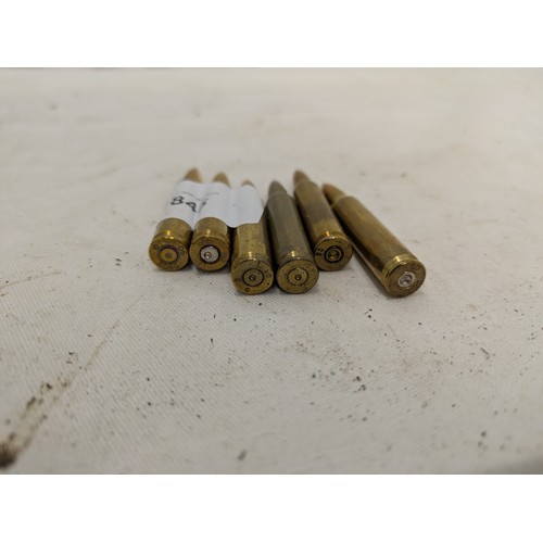 1845 - A selection of 6 spent bullet casings.233