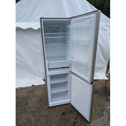 454 - A hisense digital brushed steel upright fridge freezer - working