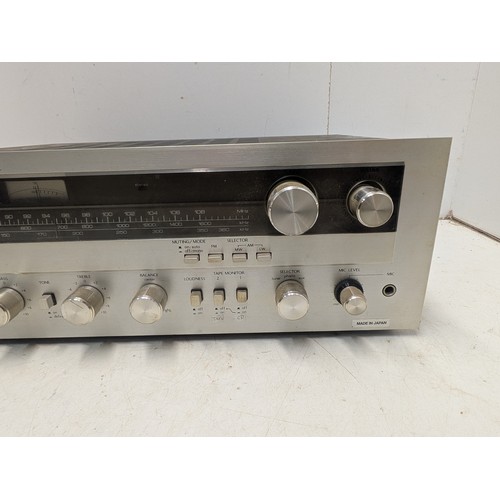 1244 - A Mitsubishi Model DA-R210L Stereo Receiver