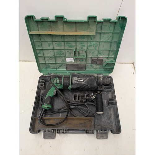 1603 - A Hitachi Hikoki model dh 26px corded rotary hammer in case