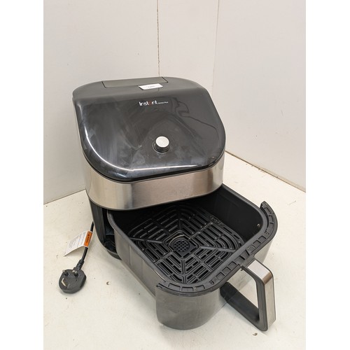 1205 - An instant vortex plus air fryer