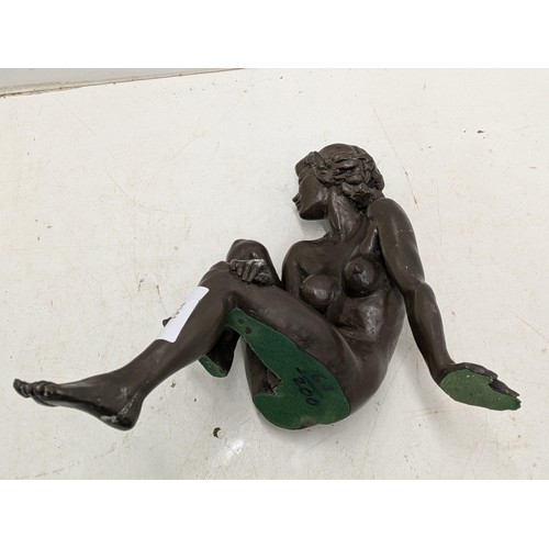 1914 - A bronze sculpture of a nudes woman, damaged previous repairs evident