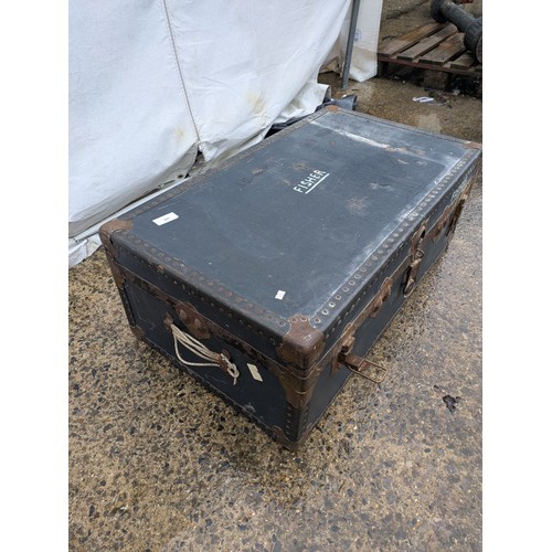 409 - A vintage canvas storage trunk with metal latches