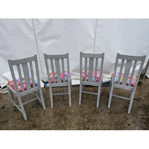 418 - A Set of 4 painted pine dining chairs with floral seat bases