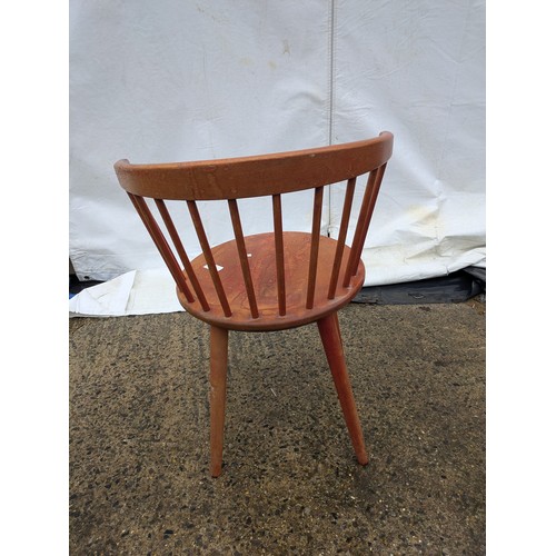 421 - A vintage pine spoke backed chair